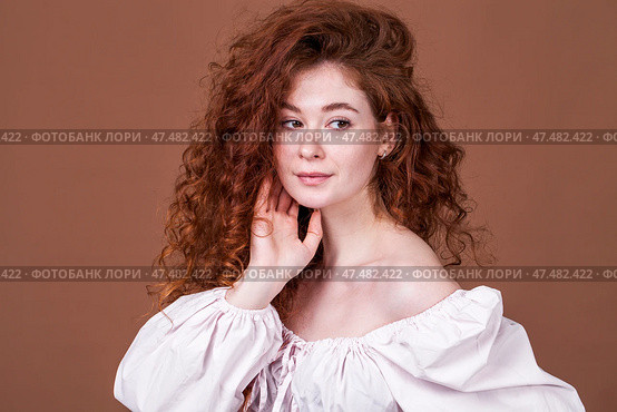 Studio portrait of a red-haired girl. Стоковое фото, фотограф Андрей Аркуша / Фотобанк Лори