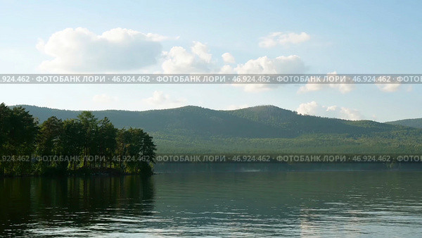 Summer landscape with river, cloudy sky, forest and sun timelapse. Стоковое фото, фотограф David Kashakhi / Фотобанк Лори