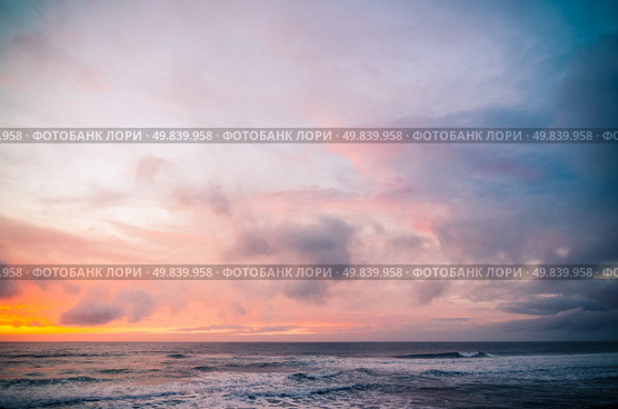Sunset on a beach, beautiful sky and silky water. Стоковое фото, агентство Ingram Publishing / Фотобанк Лори
