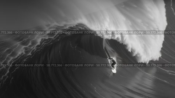 Surfer riding giant waves in monochrome. Стоковое AI-видео, аниматор Юрий Поздников / Фотобанк Лори
