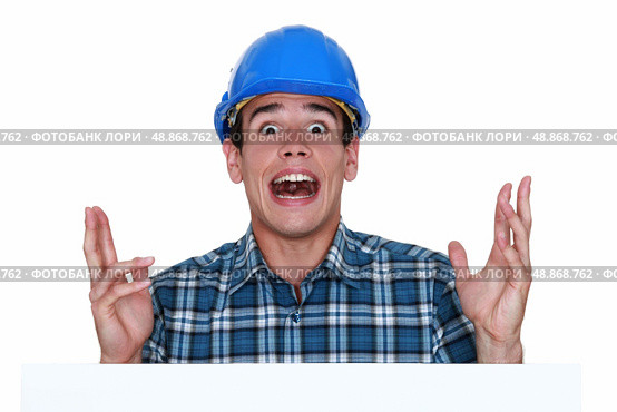 surprised craftsman screaming. Стоковое фото, агентство Ingram Publishing / Фотобанк Лори
