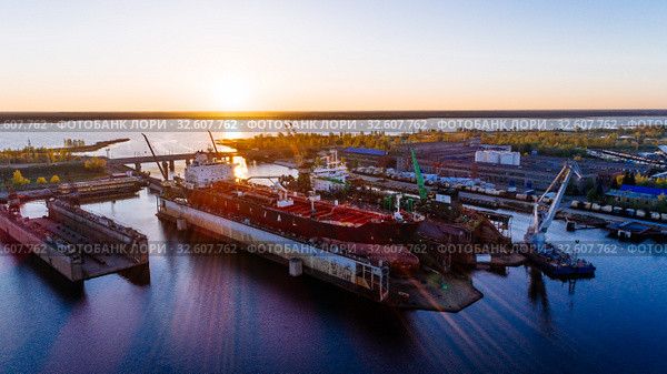 Tanker vessel repair in dry dock Shipyard, Drone shot. Стоковое фото, фотограф Aleksejs Bergmanis / Фотобанк Лори