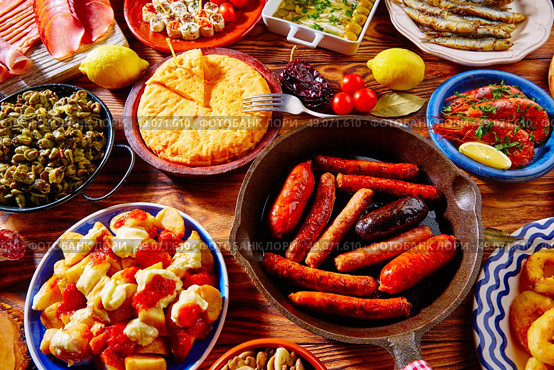 Tapas from spain varied mix of most popular tapa mediterranean food. Стоковое фото, агентство Ingram Publishing / Фотобанк Лори