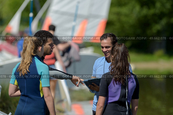 team and the windsurfing training. Стоковое фото, агентство Ingram Publishing / Фотобанк Лори