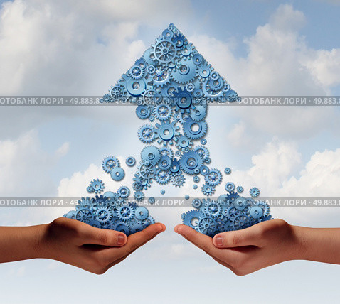 Team work for success business concept as two hands holding groups of gears and cogs thathave come together to form an upward arrow as a symbol for financial growth partnership building together. Стоковое фото, агентство Ingram Publishing / Фотобанк Лори