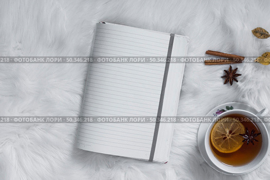 teatime with opened blank notebook. Стоковое фото, агентство Ingram Publishing / Фотобанк Лори
