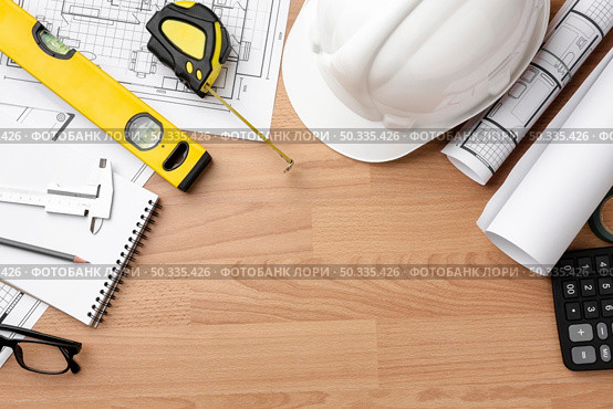 technical plan drawing with spirit level construction hat. Стоковое фото, агентство Ingram Publishing / Фотобанк Лори