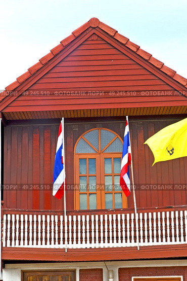 temple   in  bangkok thailand incision red venetian blind and terrace waving flag . Стоковое фото, агентство Ingram Publishing / Фотобанк Лори
