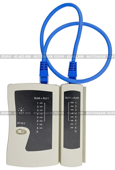 Тестер сетевых кабелей и кабель на белом фоне. Network tester on white background. Стоковое фото, фотограф Татьяна Д / Фотобанк Лори
