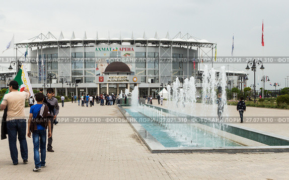 The Akhmat Arena Stadium in Grozny. Chechnya. Стадион «Ахмат-Арена» (Спорткомплекс имени Ахмат-Хаджи Кадырова) в Грозном перед началом футбольного матча (2013 год). Редакционное фото, фотограф Jon Maldini / Фотобанк Лори