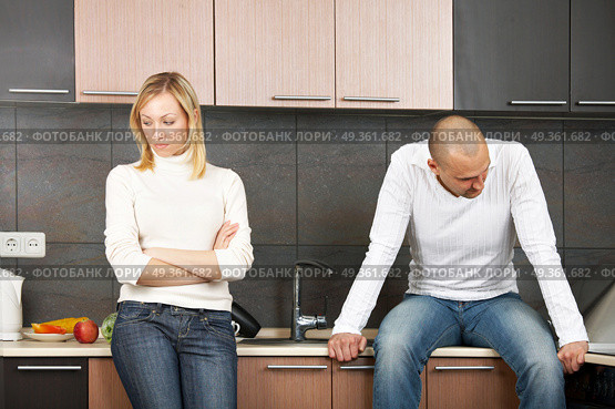 The image of quarrel of a married couple on kitchen. Quarrel. Стоковое фото, агентство Ingram Publishing / Фотобанк Лори