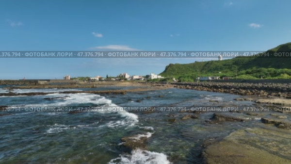 The Magang tidal zone in Taiwan. This is one of the littoral zones of the country with a rich coastline ecology and the largest number of green algae. Стоковое видео, видеограф  Сергей Фомин / Фотобанк Лори