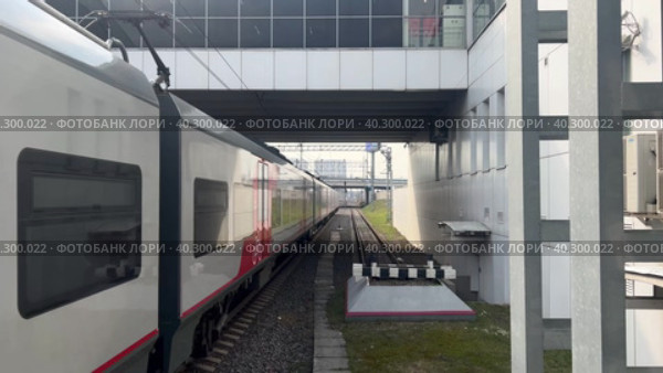 The Moscow Time high-speed train leaves the Locomotive station in Moscow.Russia. Moscow. 11.04.2023. Редакционное видео, видеограф Ярославский Максим / Фотобанк Лори