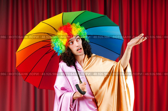 Theater concept with masked actor . Стоковое фото, агентство Ingram Publishing / Фотобанк Лори