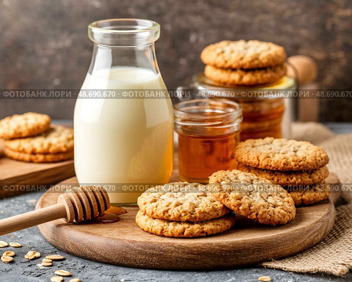 There is fresh milk, oatmeal cookies and honey on the table. Morning breakfast. Still life. Стоковое AI-изображение, AI-художник Сергей Елизарьев / Фотобанк Лори