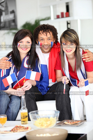 Three French supporters. Стоковое фото, агентство Ingram Publishing / Фотобанк Лори