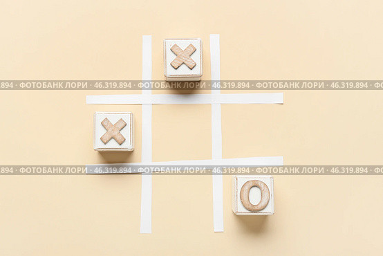 Tic-tac-toe game on color background. Стоковое фото, фотограф Pixel_shot / Фотобанк Лори