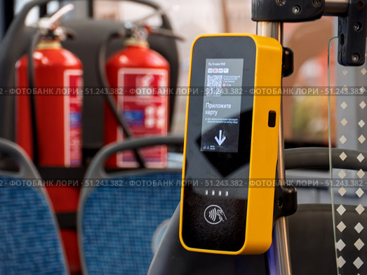 Ticket Validator Device in Moscow City Bus. Редакционное фото, фотограф Sergakoff / Фотобанк Лори