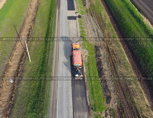 Top view of the road repair. Technics for repair of asphalt. Replacement of asphalt pavement. Стоковое фото, фотограф Леонид Еремейчук / Фотобанк Лори