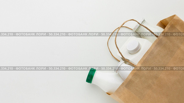 top view paper bag with milk bottles. Стоковое фото, агентство Ingram Publishing / Фотобанк Лори