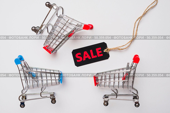 toy supermarket carts with sale label. Стоковое фото, агентство Ingram Publishing / Фотобанк Лори
