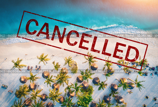 Travel and holidays cancelled due to epidemic of coronavirus. Tourism and resort cancelation due to Covid-19. Aerial view of beautiful tropical sandy beach, palm trees, blue sea in summer and text. Стоковое фото, агентство Ingram Publishing / Фотобанк Лори