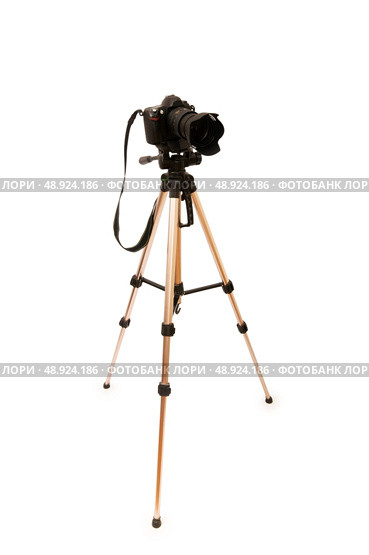 Tripod and camera isolated on the white background	. Стоковое фото, агентство Ingram Publishing / Фотобанк Лори