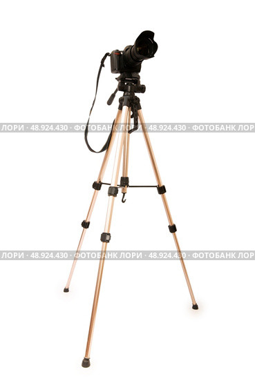 Tripod and camera isolated on the white background. Стоковое фото, агентство Ingram Publishing / Фотобанк Лори