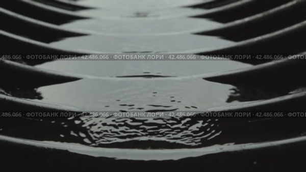 Труба водяных стоков. черная гофрированная труба  water drain pipe. black corrugated pipe. Стоковое видео, видеограф Опока Алексей / Фотобанк Лори