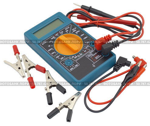 Цифровой мультиметр и радиоэлементы на белом фоне. Digital  multimeter on a white background. Стоковое фото, фотограф Татьяна Д / Фотобанк Лори