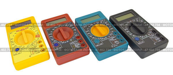 Цифровые мультиметры на белом фоне. Digital  multimeters on a white background. Стоковое фото, фотограф Татьяна Д / Фотобанк Лори