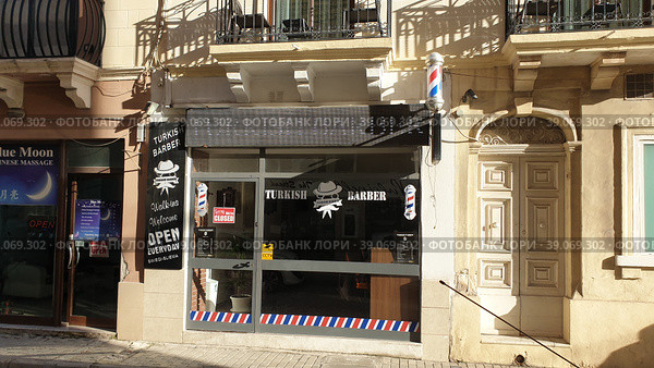 Турецкая парикмахерская (Turkish Barber Shop). 12 Triq Sir William Reid. Город Гзира. Остров Мальта (2023 год). Редакционное фото, фотограф lana1501 / Фотобанк Лори