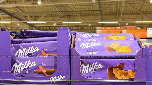 Two boxes of Milka chocolate covered wafers. Russia. Moscow. 02.08.25. Редакционное фото, фотограф Ярославский Максим / Фотобанк Лори