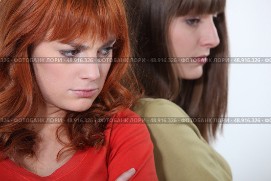 two girlfriends having a quarrel. Стоковое фото, агентство Ingram Publishing / Фотобанк Лори