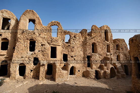 Uninhabited fortified village with houses and granaries, Tunisia. Ksar of Mgabla, Berber, Tataouine. Стоковое фото, фотограф Яков Филимонов / Фотобанк Лори