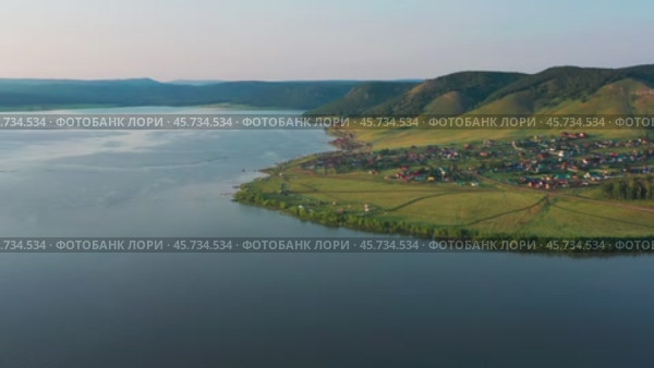 Южный Урал, Башкортостан, Нугушское водохранилище летом. Вид с воздуха. Southern Urals, Bashkortostan, Nugush reservoir in summer. Aerial view. Стоковое видео, видеограф Евгений Романов / Фотобанк Лори