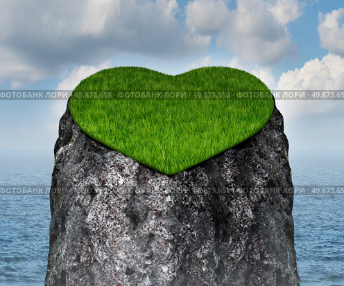Valentine heart shaped mountain cliff island surrounded by water as a lonely and romantic symbol of the challenges of dating and searching for a loving relationship and abstinence from sex. Стоковое фото, агентство Ingram Publishing / Фотобанк Лори