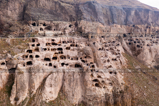 Vardzia cave monastery structures carved into mountain. Стоковое фото, фотограф Яков Филимонов / Фотобанк Лори