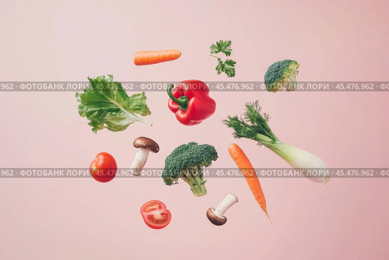 Various colorful vegetables falling at pale pink background. Flying veggie on a plain pastel color backdrop. Healthy food. Detox and dieting concept. Fresh carrot, pepper, broccoli, tomato levitating. Стоковое фото, фотограф Марина Демидюк / Фотобанк Лори