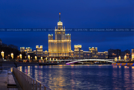 View of new year with high-rise building on Kotelnicheskaya embankment  and Bolshoy Ustinsky bridge on the horizon. Russia (2020 год). Стоковое фото, фотограф Наталья Волкова / Фотобанк Лори