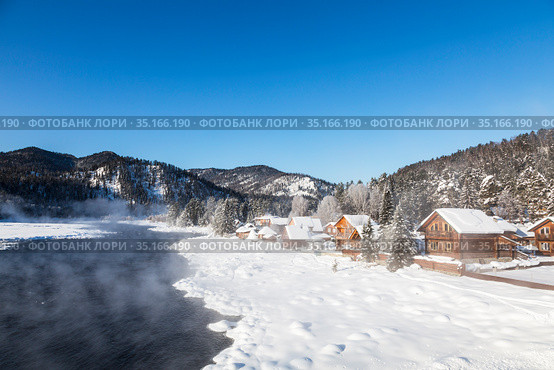View of the winter Altai with the Biya river, Artybash village and mountains on the horizon. Altai Republic, Russia (2020 год). Стоковое фото, фотограф Наталья Волкова / Фотобанк Лори