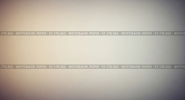 Vintage gradient background with soft blurred texture and vignette, simple abstract backdrop for presentation, banner or retro style design. Стоковое фото, фотограф Павел Муравьев / Фотобанк Лори