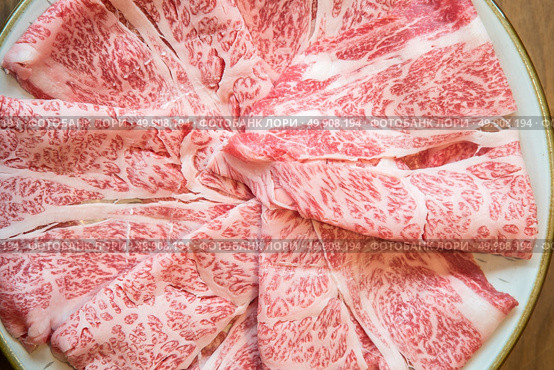 Wagyu A5 Beef meat texture for food background. Стоковое фото, агентство Ingram Publishing / Фотобанк Лори