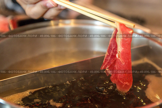 Wagyu Beef Premium for shabu and yakiniku with chopstocks. Стоковое фото, агентство Ingram Publishing / Фотобанк Лори