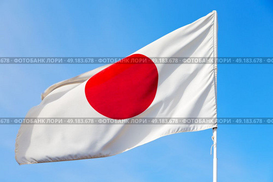 waving flag in the blue sky japancolour and wave. Стоковое фото, агентство Ingram Publishing / Фотобанк Лори