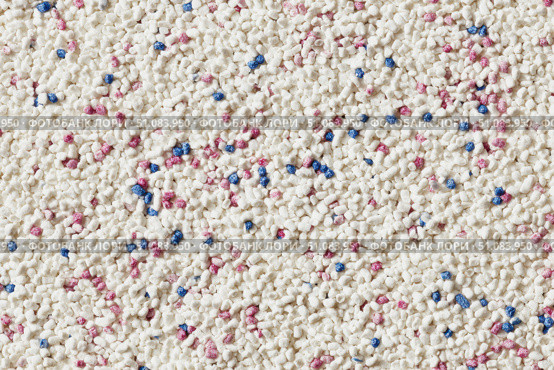 White cat litter round particles surface with small blue colored particles, top view. Granules of pet white-gray litter background. Dog litter texture backdrop with small dots. Flat lay, copy space. Стоковое AI-изображение, AI-художник Марина Демидюк / Фотобанк Лори