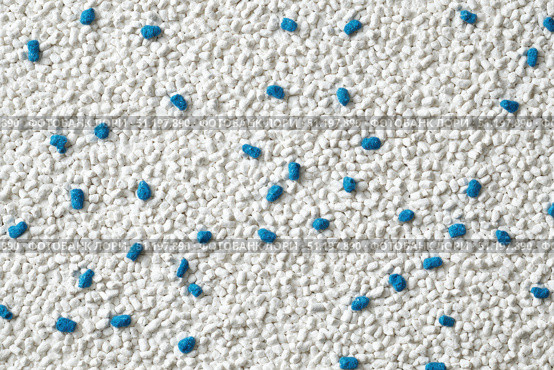 White cat litter round particles surface with small blue colored particles, top view. Granules of pet white-gray litter background. Dog litter texture backdrop with small dots. Flat lay, copy space. Стоковое AI-изображение, AI-художник Марина Демидюк / Фотобанк Лори