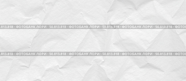 White crumpled paper background with sharp geometric folds, abstract creased texture of folded sheet, empty vintage backdrop for design project or creative art and poster. Стоковое фото, фотограф Павел Муравьев / Фотобанк Лори