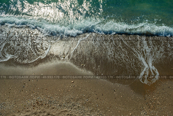 white slow waves in sea on sand beach. Стоковое фото, агентство Ingram Publishing / Фотобанк Лори