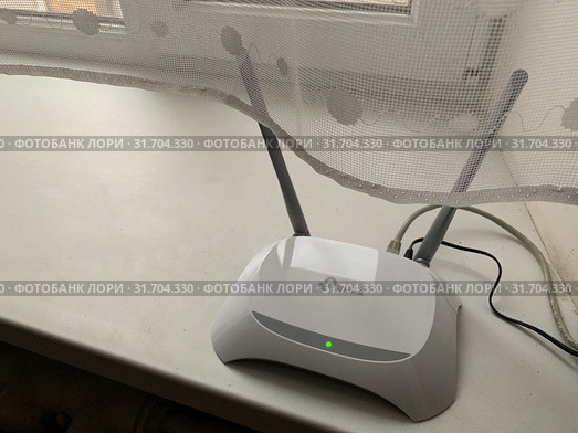 Wi-Fi роутер TP-Link (2019 год). Редакционное фото, фотограф Кузнецов Максим / Фотобанк Лори